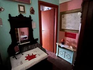 a bedroom with a bed with a red star on it at “Corona Grossa” - due posti letto - A in Brusasco