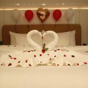 Krevet ili kreveti u jedinici u okviru objekta Royal Mansoura Residence Hotel