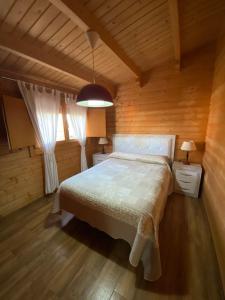 A bed or beds in a room at Casas Guemon