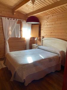 A bed or beds in a room at Casas Guemon
