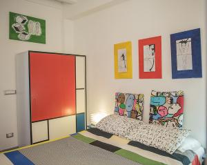Postel nebo postele na pokoji v ubytování Suite D'Autore Art Design Gallery