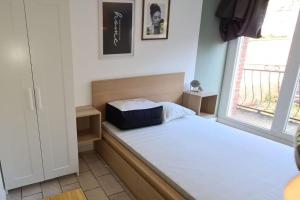 Postel nebo postele na pokoji v ubytování L'olivier