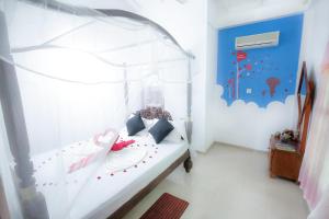 Postel nebo postele na pokoji v ubytování La Villa