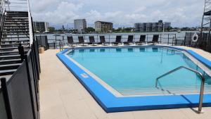a large swimming pool on top of a cruise ship at By the Beach Rentals in Clearwater Beach