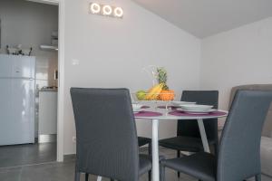 Kuchyň nebo kuchyňský kout v ubytování Apartments Sonata