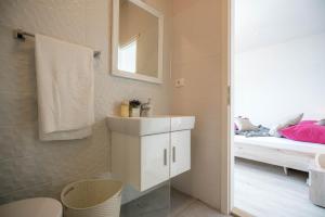 Postel nebo postele na pokoji v ubytování Apartments Sonata