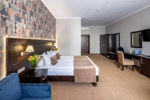 Sjónvarps- og/eða afþreyingartæki á Taurus Hotel & SPA