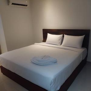 Postel nebo postele na pokoji v ubytování One Dream Hotel