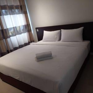 Postel nebo postele na pokoji v ubytování One Dream Hotel