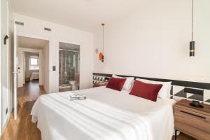 Posteľ alebo postele v izbe v ubytovaní Port Forum Apartments by Olala Homes