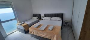 Postel nebo postele na pokoji v ubytování Apartamento Vista sul Mare