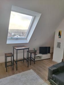 TV a/nebo společenská místnost v ubytování Ferienwohnung im Springerhof