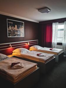 Postel nebo postele na pokoji v ubytování Hotel 108