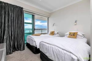 Voodi või voodid majutusasutuse AWSA Waterfront Luxury (4016) toas