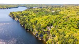 an aerial view of a river with trees at Breathtaking view of Lake Rosseau in Rosseau
