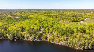 an aerial view of a lake and forest at Breathtaking view of Lake Rosseau in Rosseau