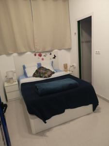 Postel nebo postele na pokoji v ubytování Hostel de las Facultades