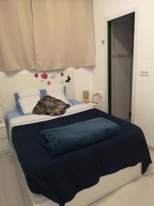 Postel nebo postele na pokoji v ubytování Hostel de las Facultades