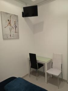 TV a/nebo společenská místnost v ubytování Hostel de las Facultades