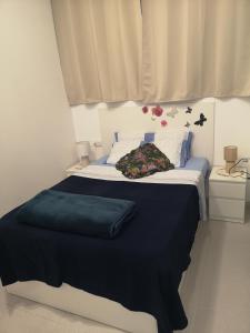 Postel nebo postele na pokoji v ubytování Hostel de las Facultades