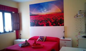 Posteľ alebo postele v izbe v ubytovaní Villa Morgante B&B