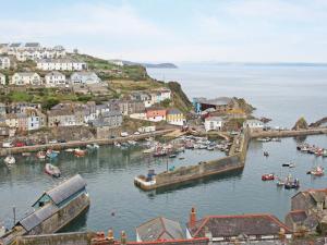 a group of boats in the water in a harbor at Valley View in St Austell