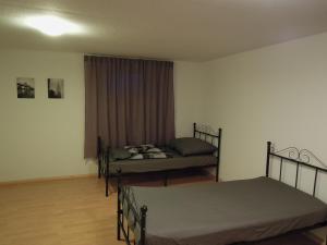 Postel nebo postele na pokoji v ubytování Ferienwohnung Monteurzimmer 2 Haus Arnstadt