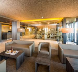 Posezení v ubytování MYHOTEL München Olching