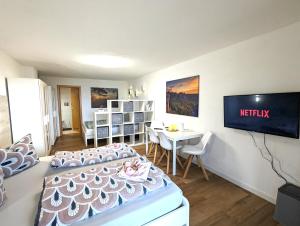Televiisor ja/või meelelahutuskeskus majutusasutuses S1 - Urlaubsmagie - Direkt loswandern, bis zu 4P