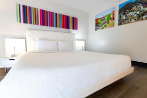 A bed or beds in a room at The Clarendon Hotel and Spa