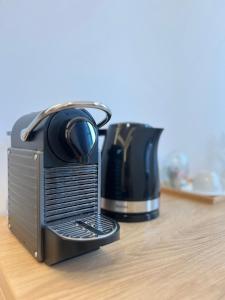 Příslušenství pro přípravu čaje a kávy v ubytování House4You - Blanari