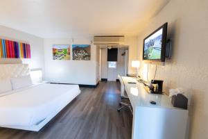 A bed or beds in a room at The Clarendon Hotel and Spa