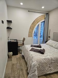 Postel nebo postele na pokoji v ubytování Habitación céntrica de Lujo Gv 1