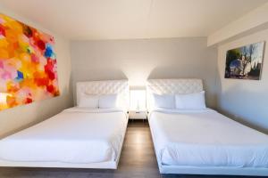 A bed or beds in a room at The Clarendon Hotel and Spa