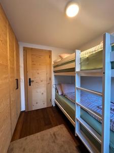 Voodi või voodid majutusasutuse Chalet Solaria 2 bedrooms with mountain and garden view toas