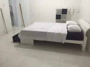 Postel nebo postele na pokoji v ubytování Eloise Appartement