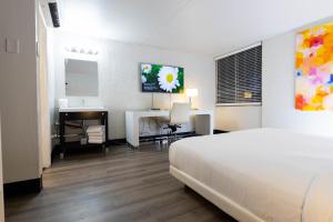 A bed or beds in a room at The Clarendon Hotel and Spa