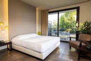 Posteľ alebo postele v izbe v ubytovaní Ananti Resort & Spa