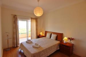 Postel nebo postele na pokoji v ubytování ViaMar Apartment + 12 fotografií