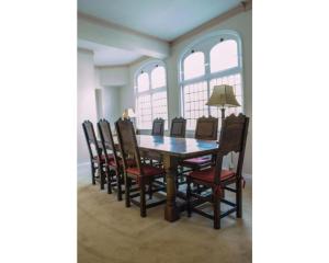 a dining room with a table and chairs at The Osney Arms Guest House in Oxford