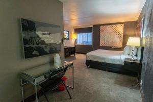 A bed or beds in a room at The Clarendon Hotel and Spa