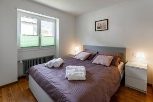 Postel nebo postele na pokoji v ubytování casa Battilana Li Curt - Poschiavo
