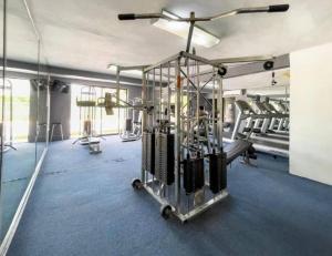 Fitness centrum a/nebo fitness zařízení v ubytování Apartamento en complejo hotelero con playa