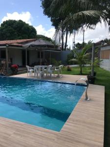 The swimming pool at or close to Casa marudá