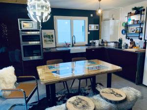 Kuchyň nebo kuchyňský kout v ubytování Apartment One