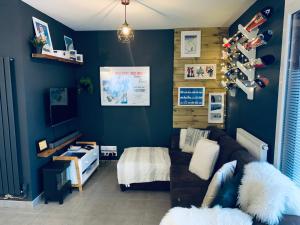 TV a/nebo společenská místnost v ubytování Apartment One