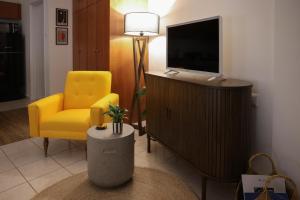 TV a/nebo společenská místnost v ubytování Happy Place Home # 1