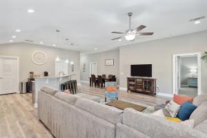 a living room with a couch and a kitchen at 1977 Esplanade St in Navarre