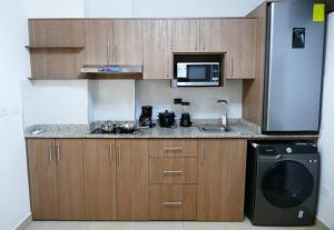 Gallery image of Ecusuites Penthouse Vía Costa Ceibos Puerto Azul in Guayaquil