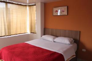 Postel nebo postele na pokoji v ubytování JULIUS Hostal